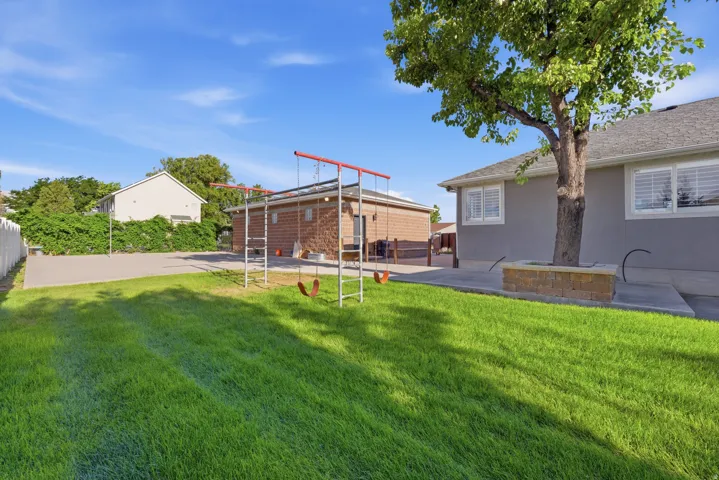 Backyard perfect for entertaining,  family play time or relaxing.
