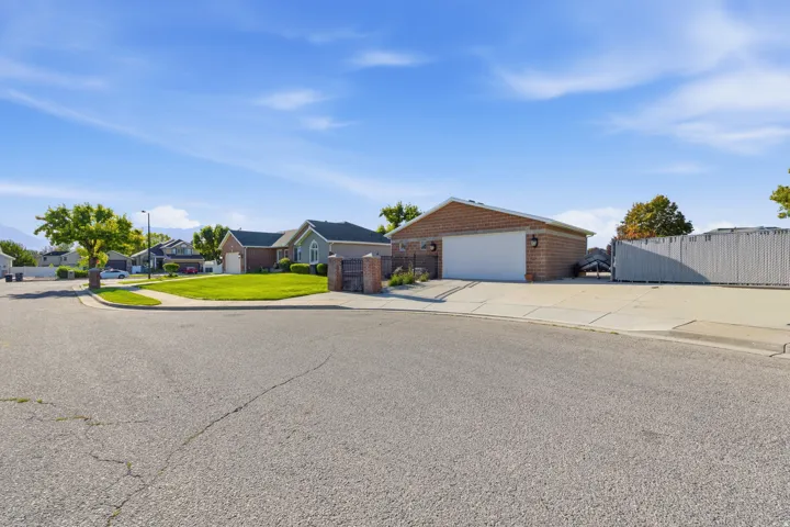 Large detached garage with RV parking.