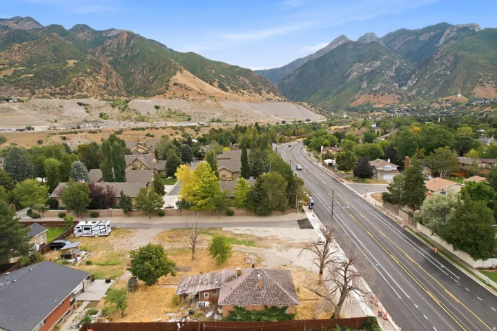 Mountainous backdrop with surrounding residential properties