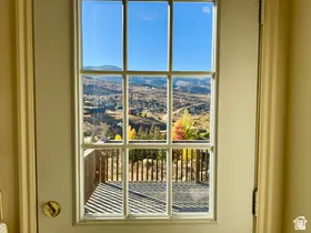 Full-light exterior door with grid-pattern windows