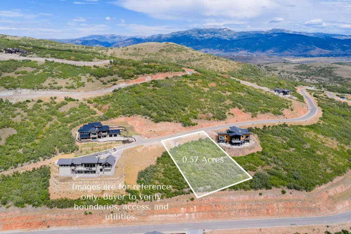 0.57-acre lot with natural landscaping and a mountain backdrop