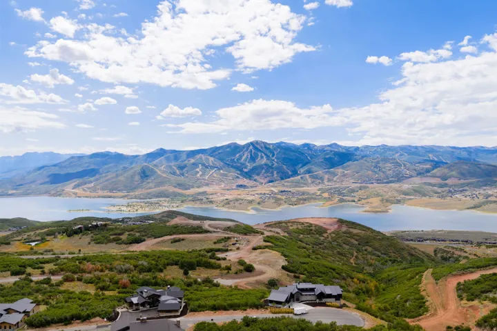 Expansive mountain landscape with a large body of water