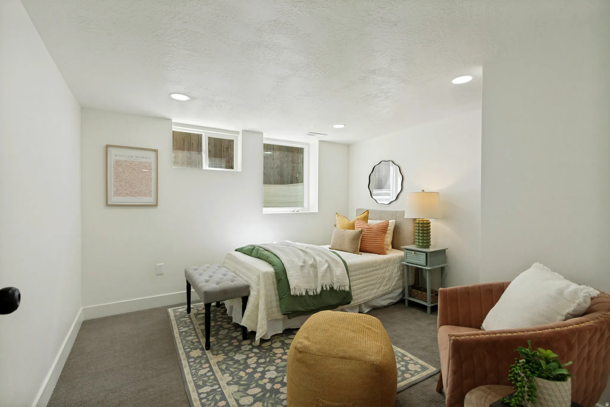 Recessed lighting, white walls, and carpeted flooring