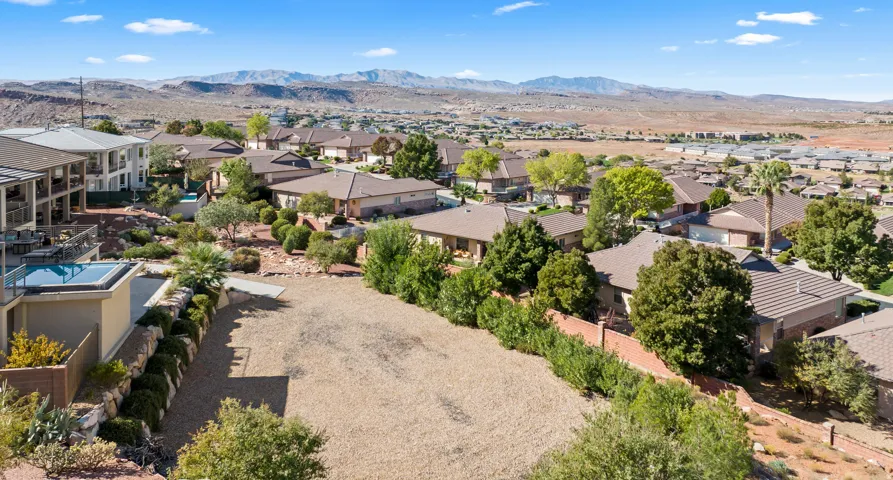 Elevated hilltop setting with expansive territorial vistas across the valley and distant mountain ranges