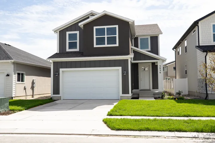 Balsam Elevation A with front yard landscaping installed.