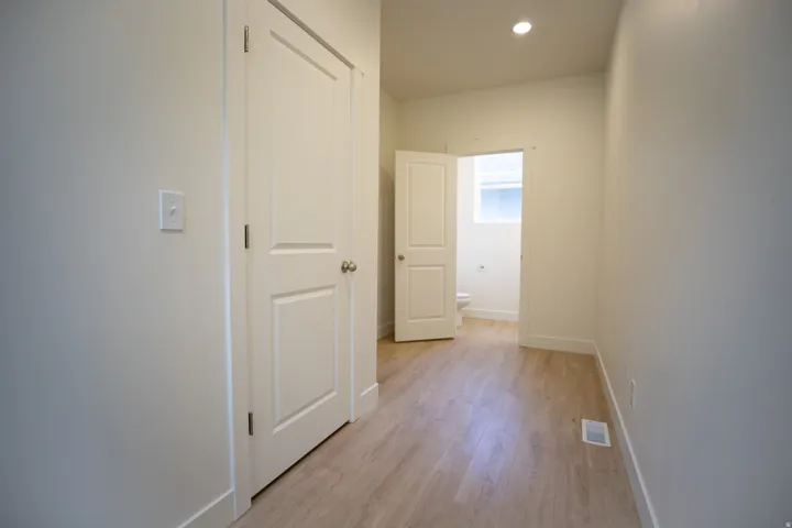 Powder bath and large closet next to garage entrance.