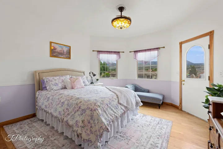 Wood-finish flooring with a decorative area rug