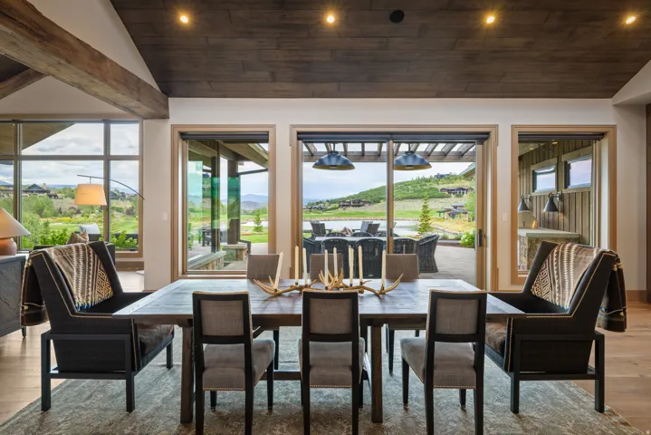 Vaulted ceiling with wood-finish planks and exposed beams