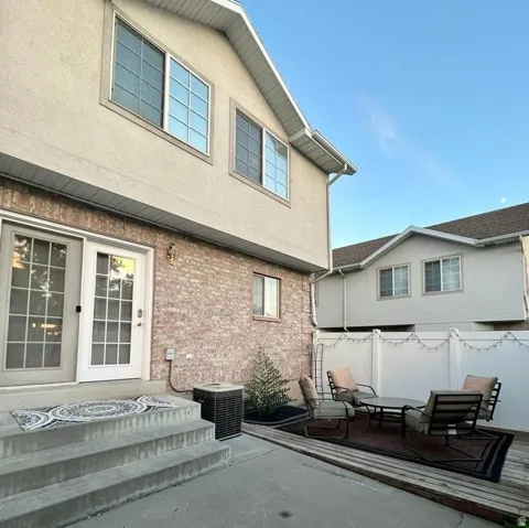 Two-story exterior with brick and stucco finishes