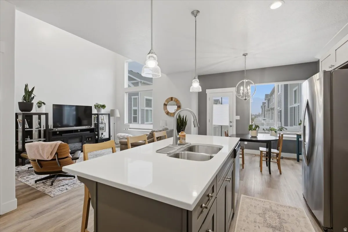 Kitchen island with a solid surface countertop and double basin sink