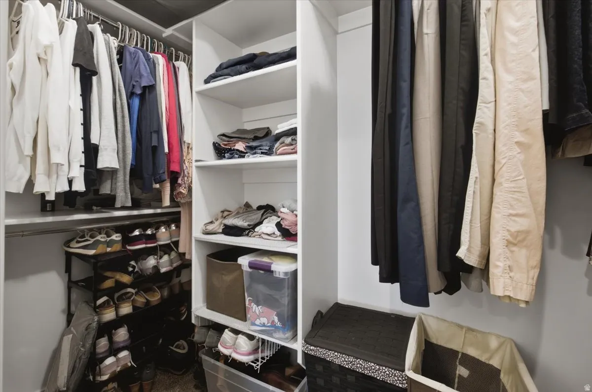Built-in closet shelving and multiple clothing rods