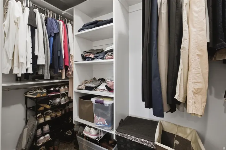 Built-in closet shelving and multiple clothing rods