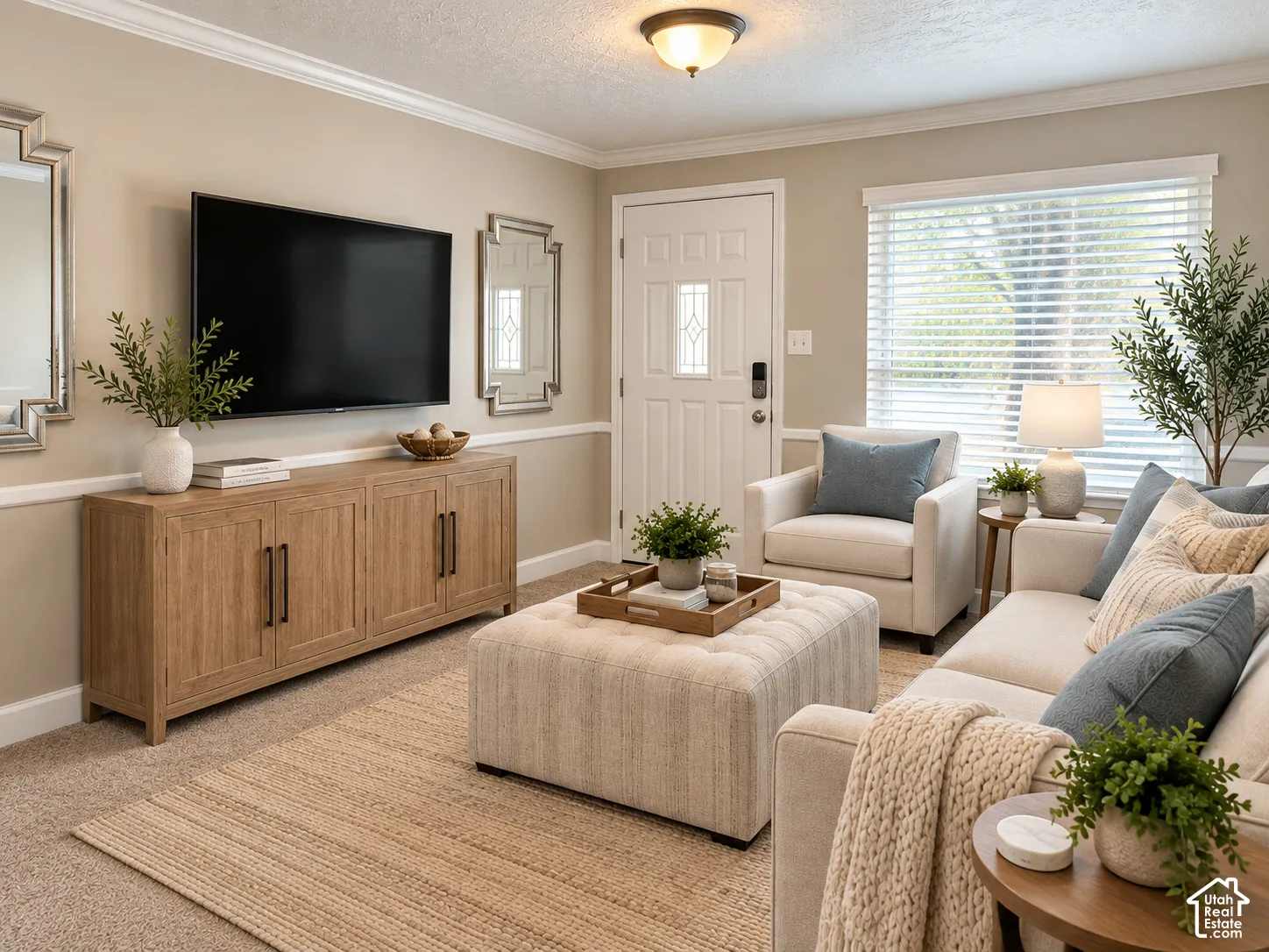 Crown molding, chair rail molding, recessed panel door, wood-finish flooring, and a large window with blinds