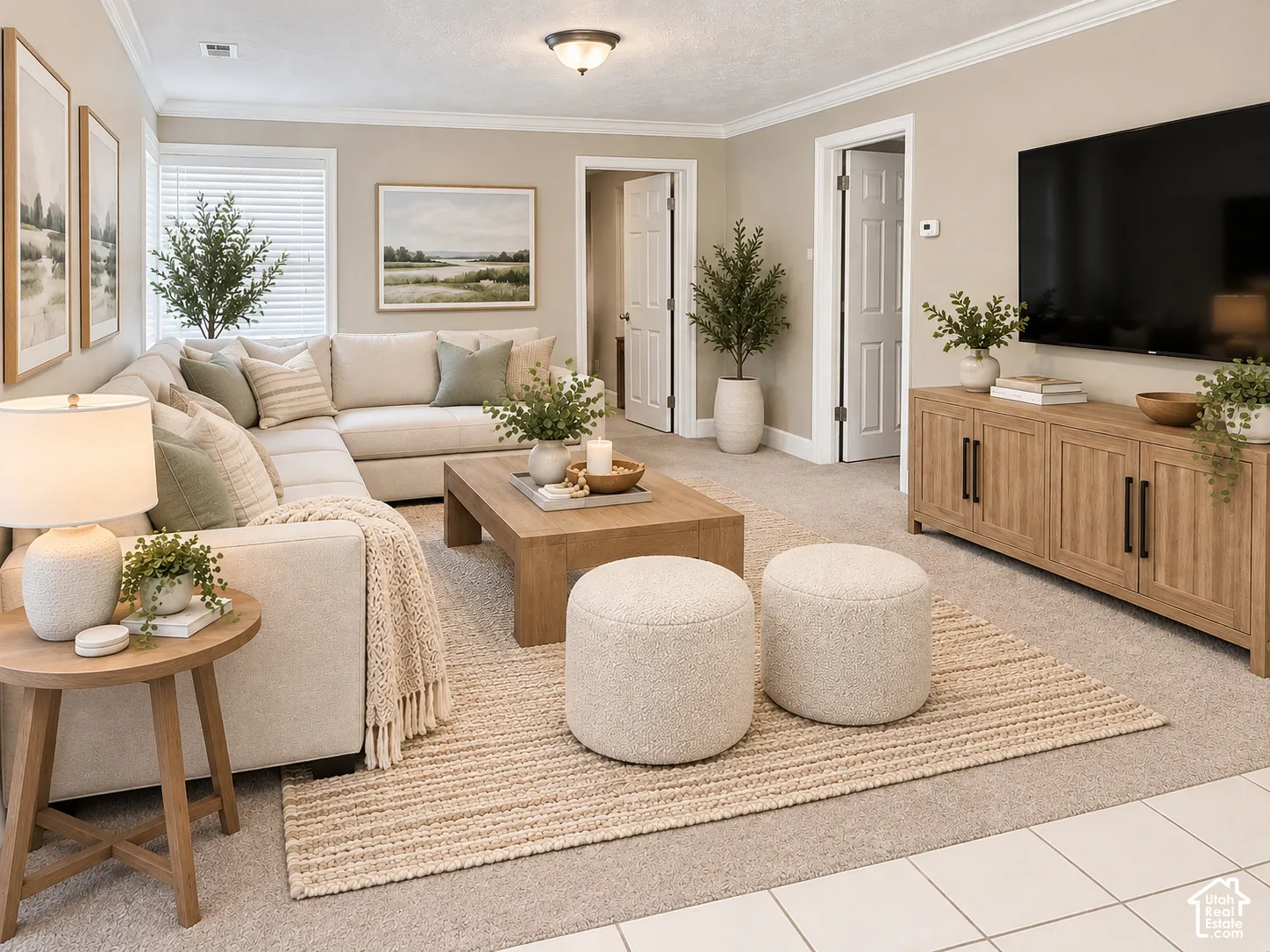 Recessed ceiling light fixture, crown molding, wall-to-wall carpeting, wood-finish console cabinet, and window with blinds