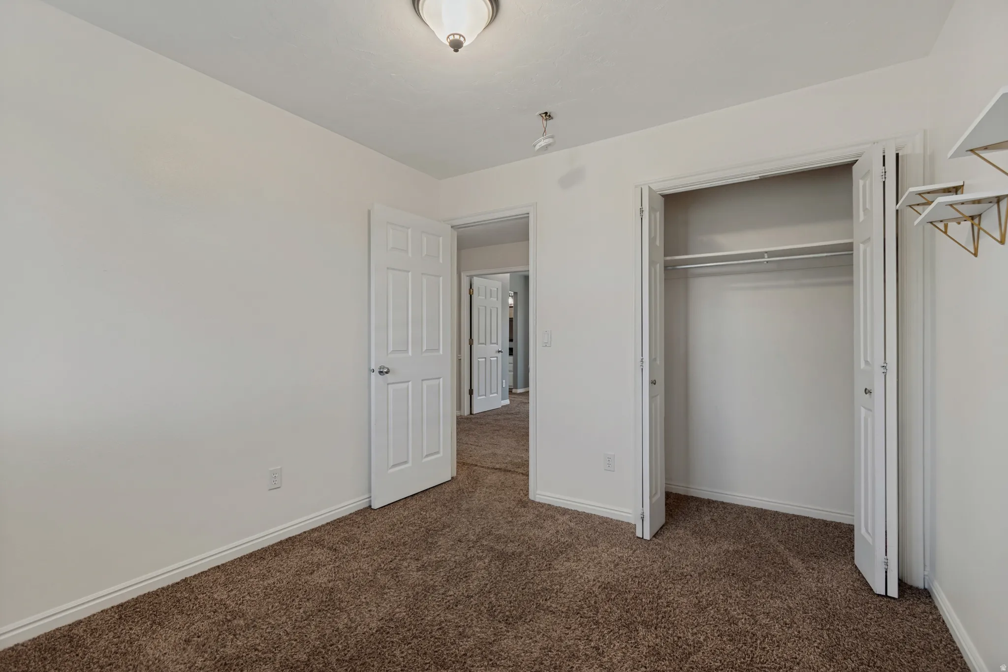 Upstairs unstaged bedroom