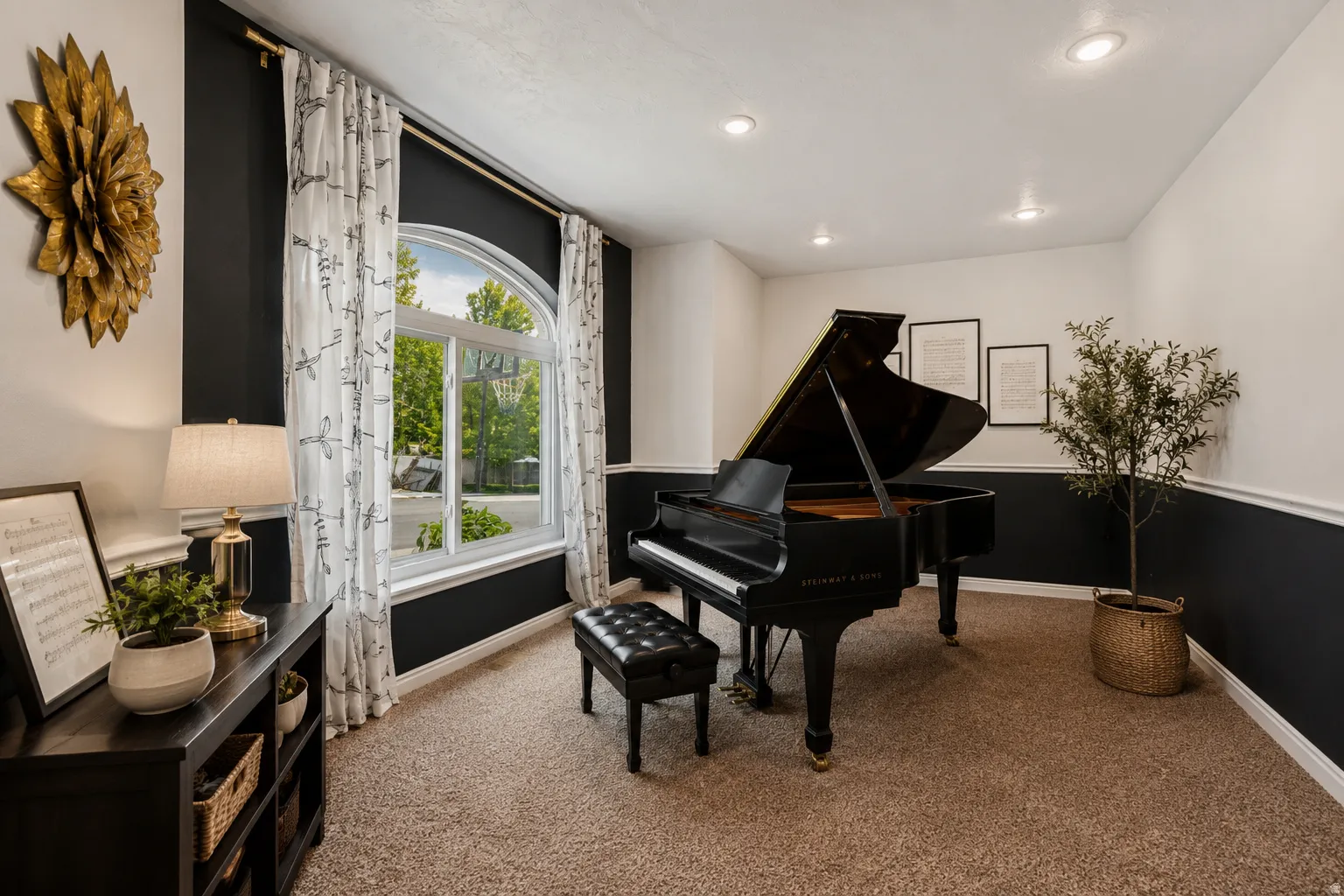 Large office or music room off the foyer abundant  natural light, arched window