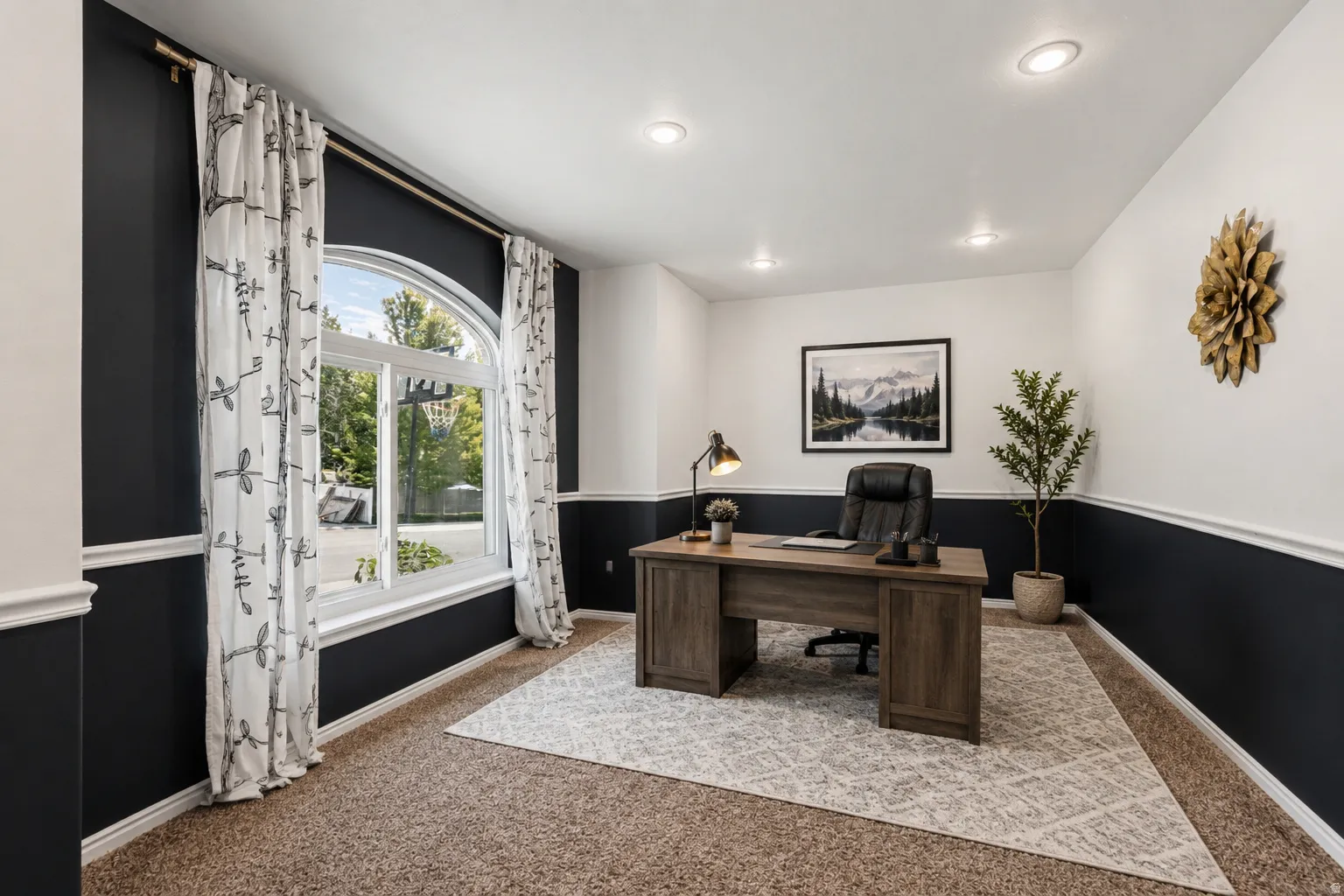 Large office or music room off the foyer abundant  natural light, arched window