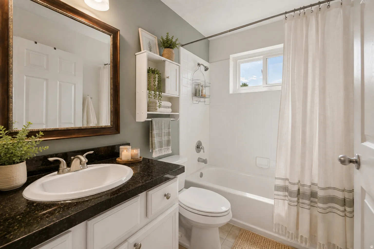 Upstairs bathroom with  built-in tub with shower