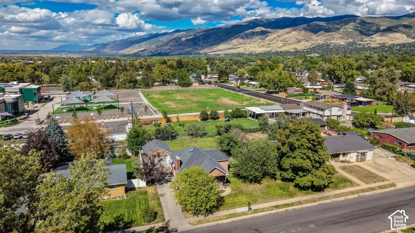 Expansive mountain backdrop with a residential neighborhood