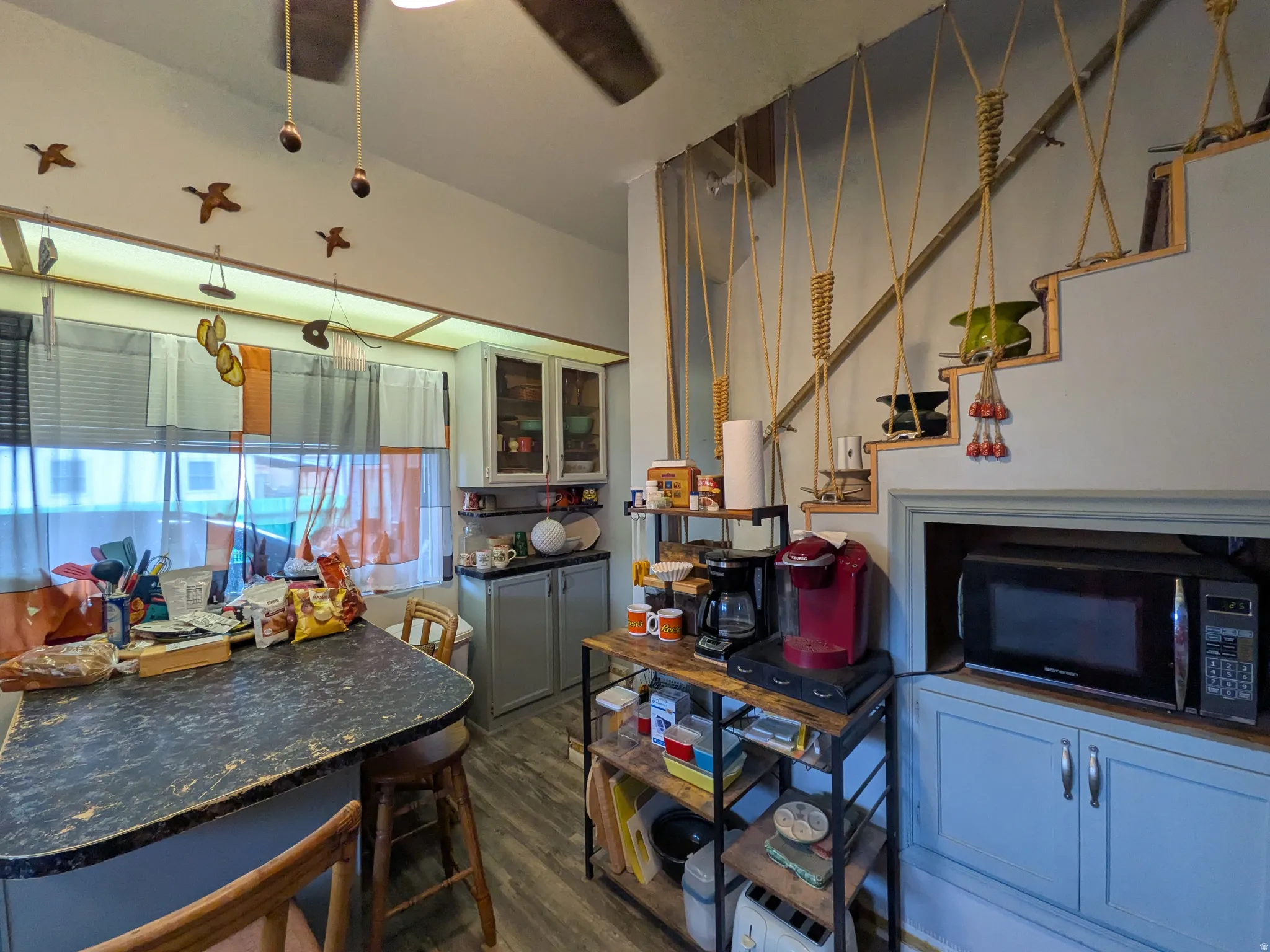 Wood-finish flooring throughout the space