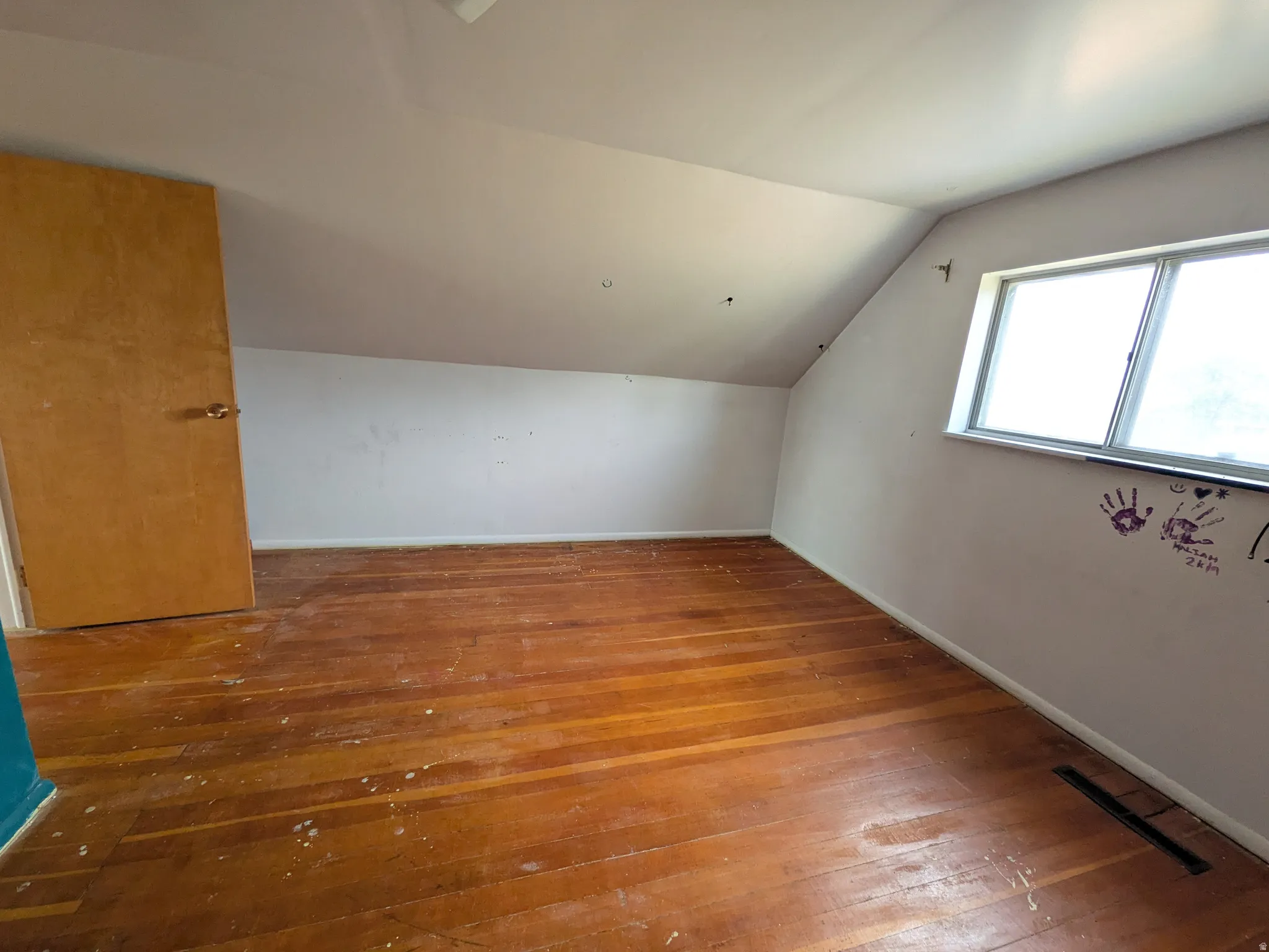 Wood-finish flooring with perimeter trim