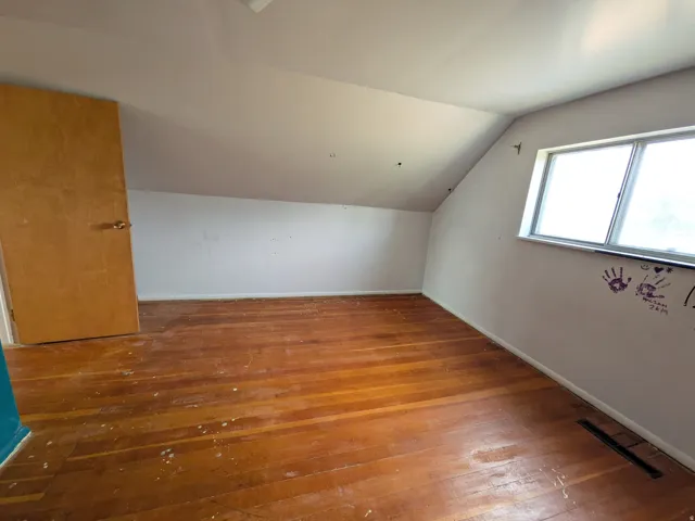 Wood-finish flooring with perimeter trim