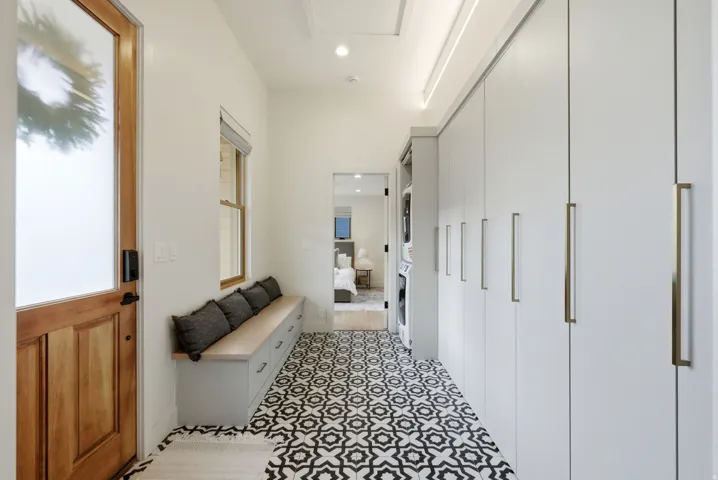 Wood-finish entry door with frosted glass panel