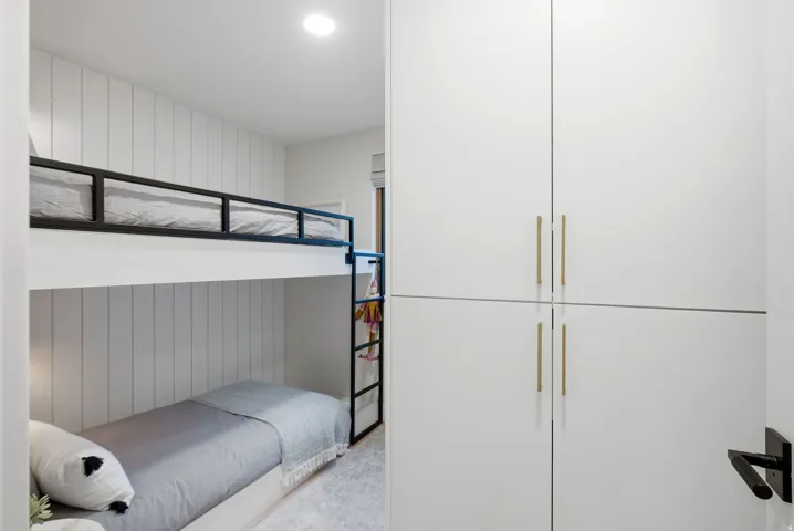 Built-in bunk beds with matte black metal framing