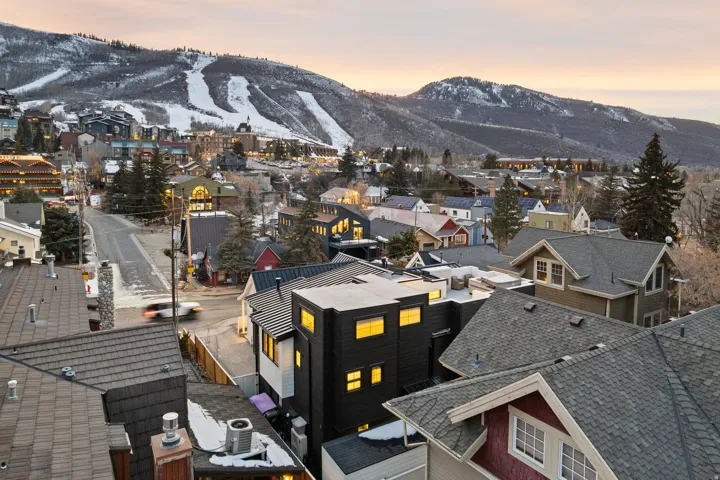 Mountainous backdrop with snow-covered slopes
