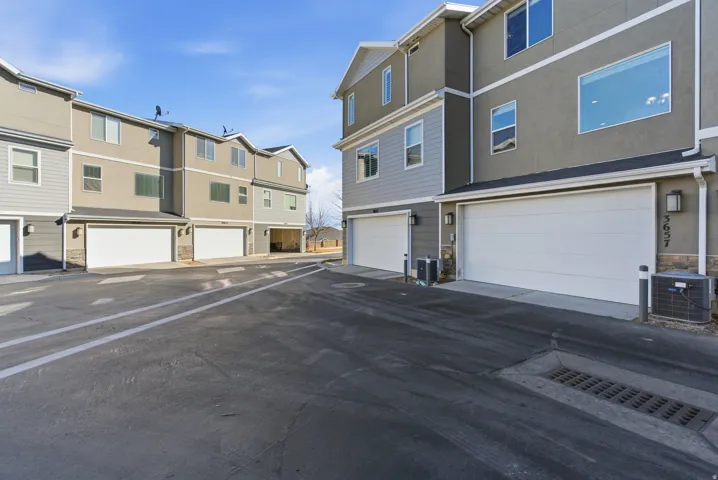 Contemporary exterior with horizontal siding and stucco finishes