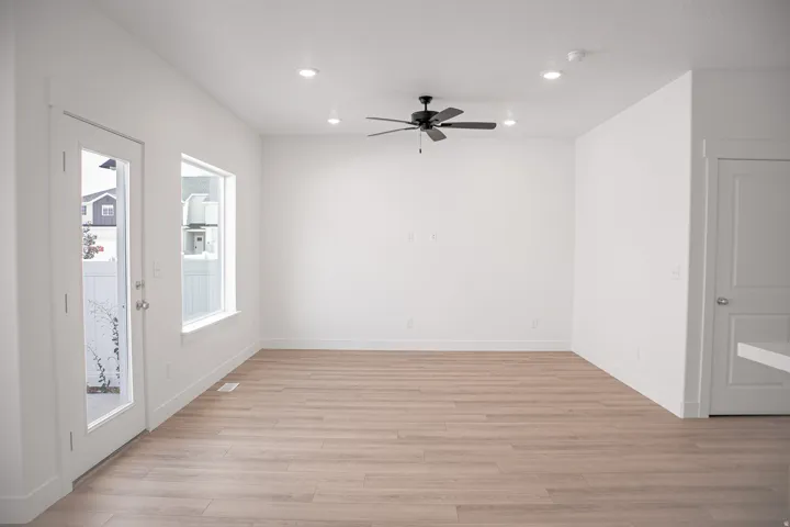 Family room with LED lighting and a ceiling fan