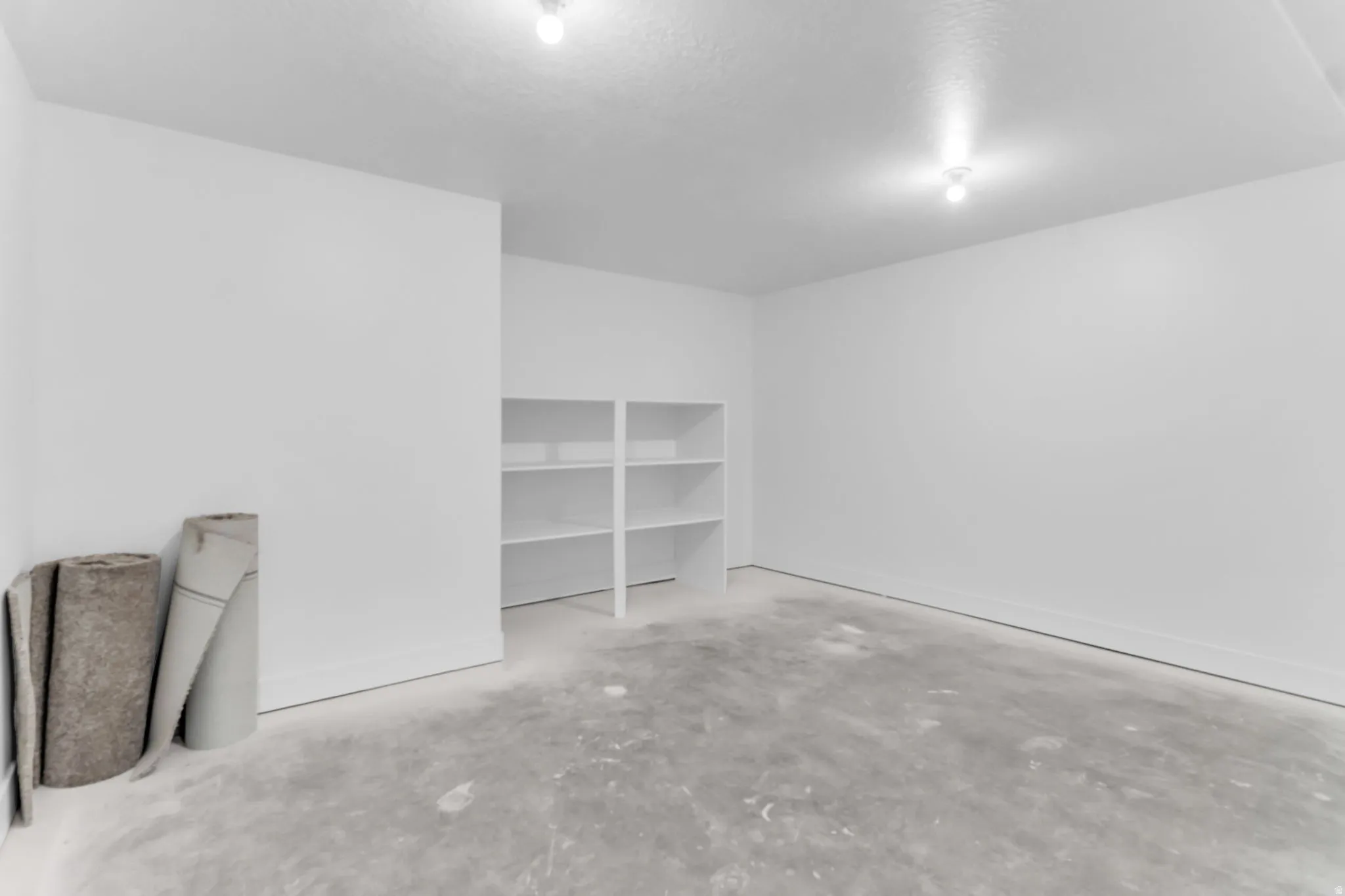 Recessed storage shelving with a white finish
