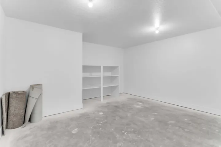 Recessed storage shelving with a white finish