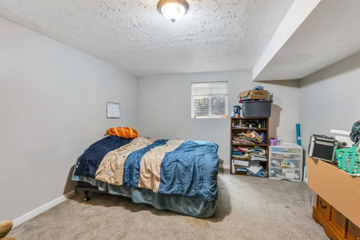 Wall-to-wall carpeting and neutral wall paint