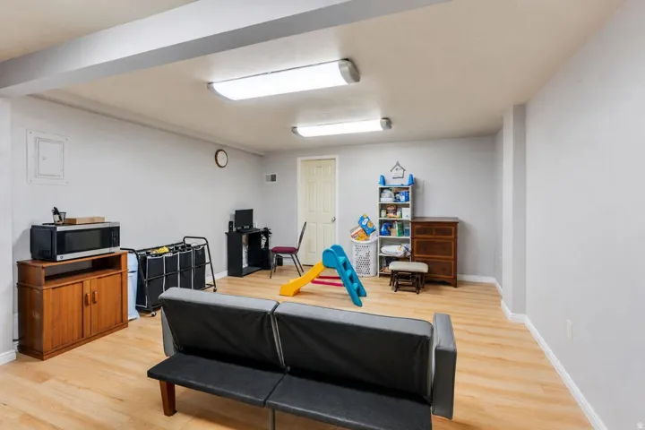 Recessed lighting and wood-finish flooring
