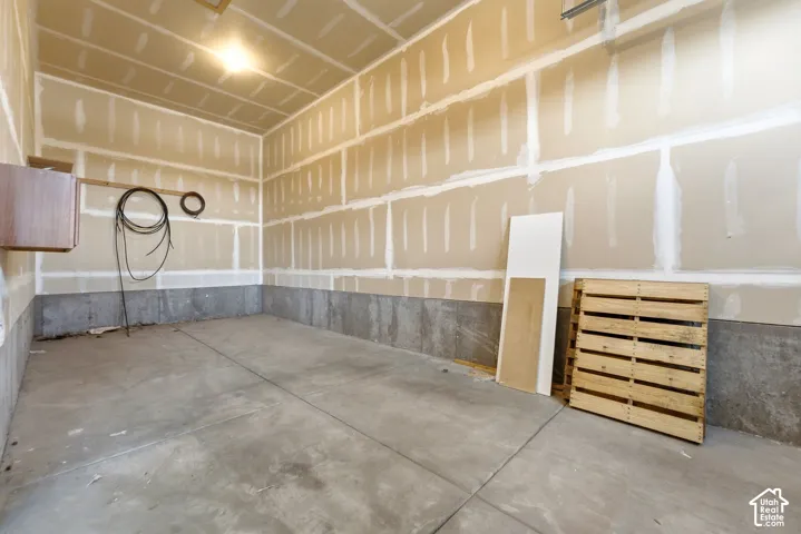 Concrete flooring and a built-in cabinet