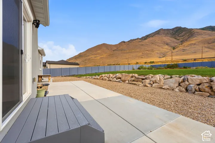 Concrete patio with gravel landscaping