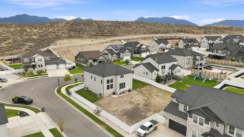 Newly constructed residence on a cul-de-sac lot with a fenced rear yard