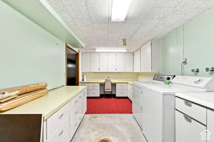 Extensive built-in cabinetry with ample counter space and storage drawers