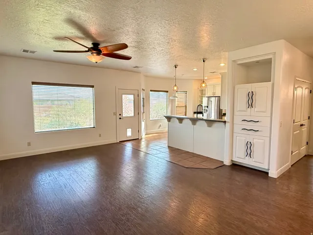 Wood-finish flooring throughout the main living area