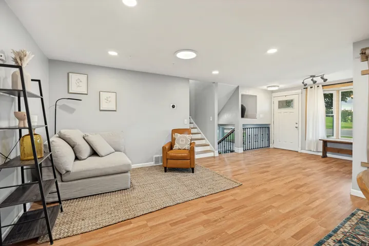 Wood-finish flooring throughout the main living space