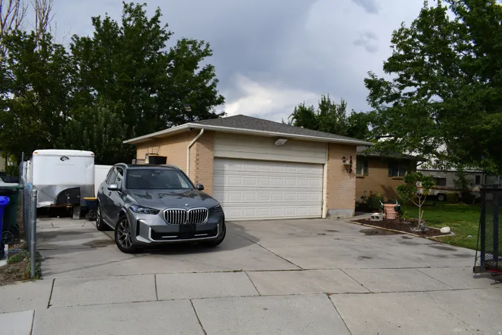 Attached two-car garage with a panel door