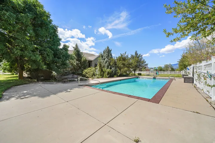 Rectangular swimming pool with a concrete surround