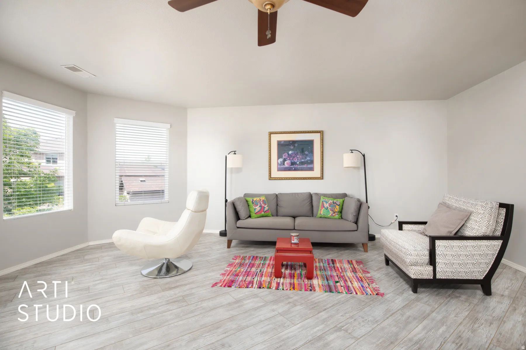 Recessed lighting, wood-finish flooring, ceiling fan, multiple windows with blinds, and light-toned wall finishes