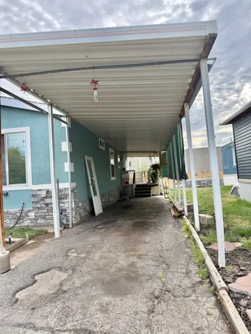 Covered carport with metal roof