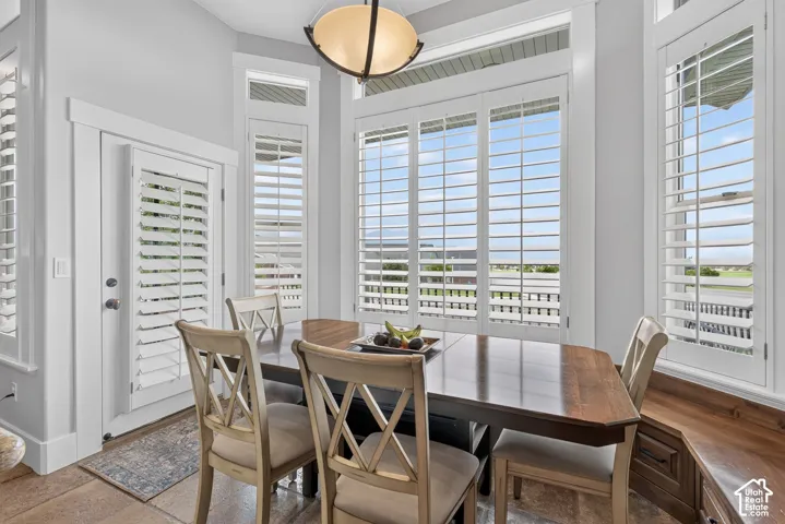 Bay window with plantation shutters and transom windows