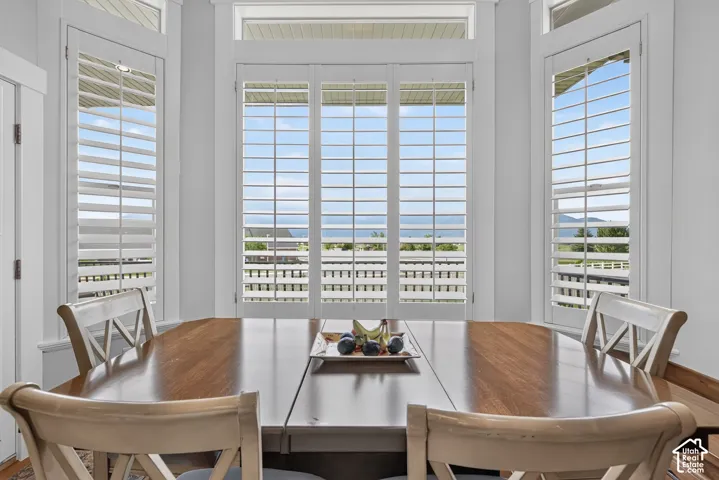 Bay window with plantation shutters and transom windows