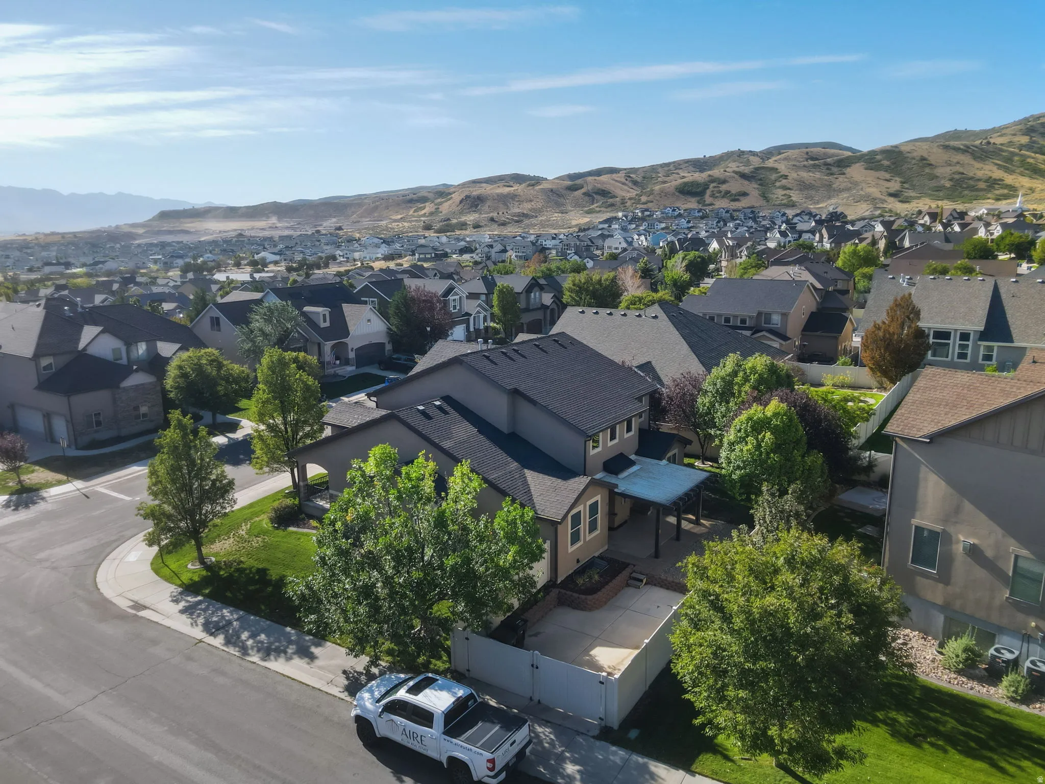 Elegant home situated on a corner lot with mature landscaping and established trees