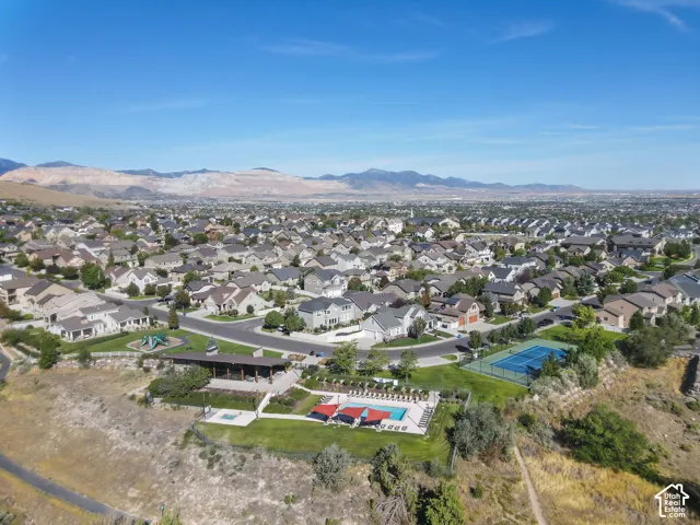 Community amenities featuring a tennis court, swimming pool, and covered pavilion