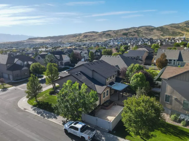 Elegant home situated on a corner lot with mature landscaping and established trees